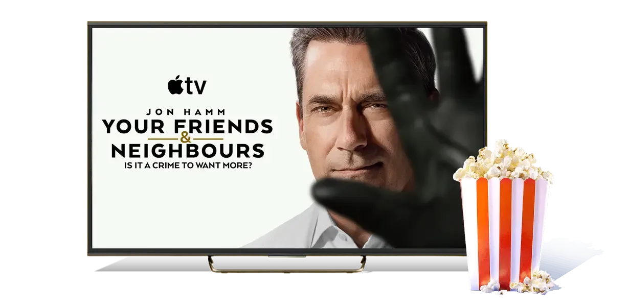 TV with popcorn. The TV shows a promotion for Your Friends & Neighbours.