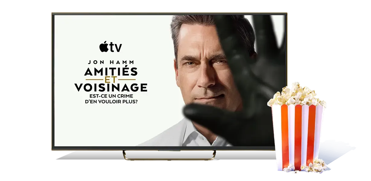 TV with popcorn. The TV shows a promotion for Your Friends & Neighbours.