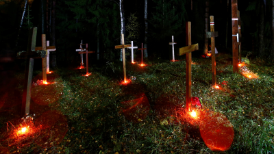 Братская могила в Куропатах на окраине Минска. Фото: Василий Федосенко / Reuters / Forum