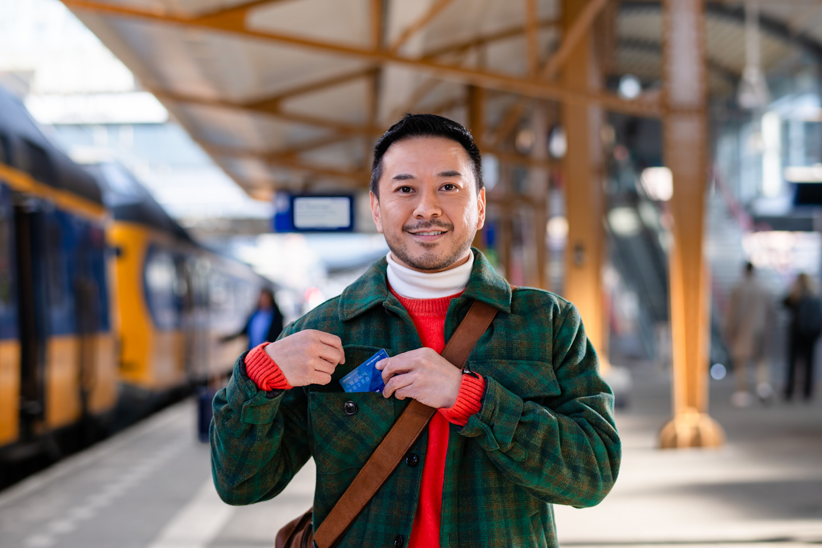 Man op het perron - voordeel