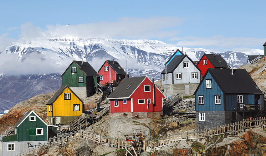 Viking: Colourful houses amid the snowy landscape of Greenland