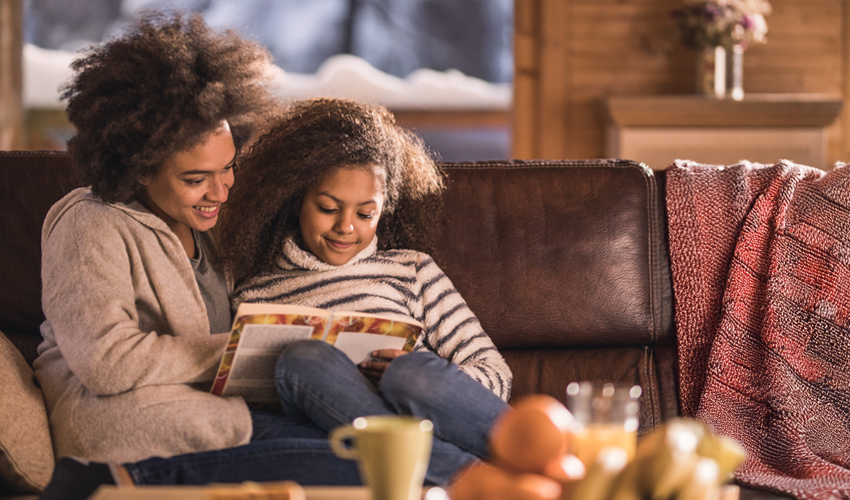 Mother and daughter cozy at home