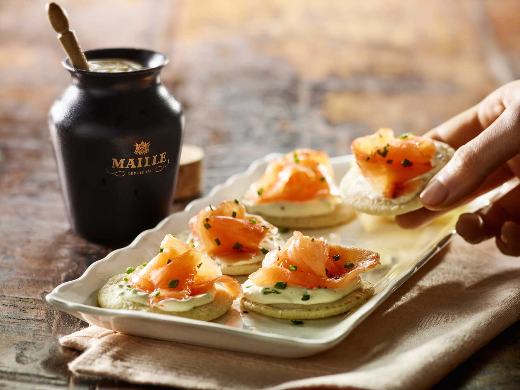 Maille Smoked Salmon Blinis Hand 