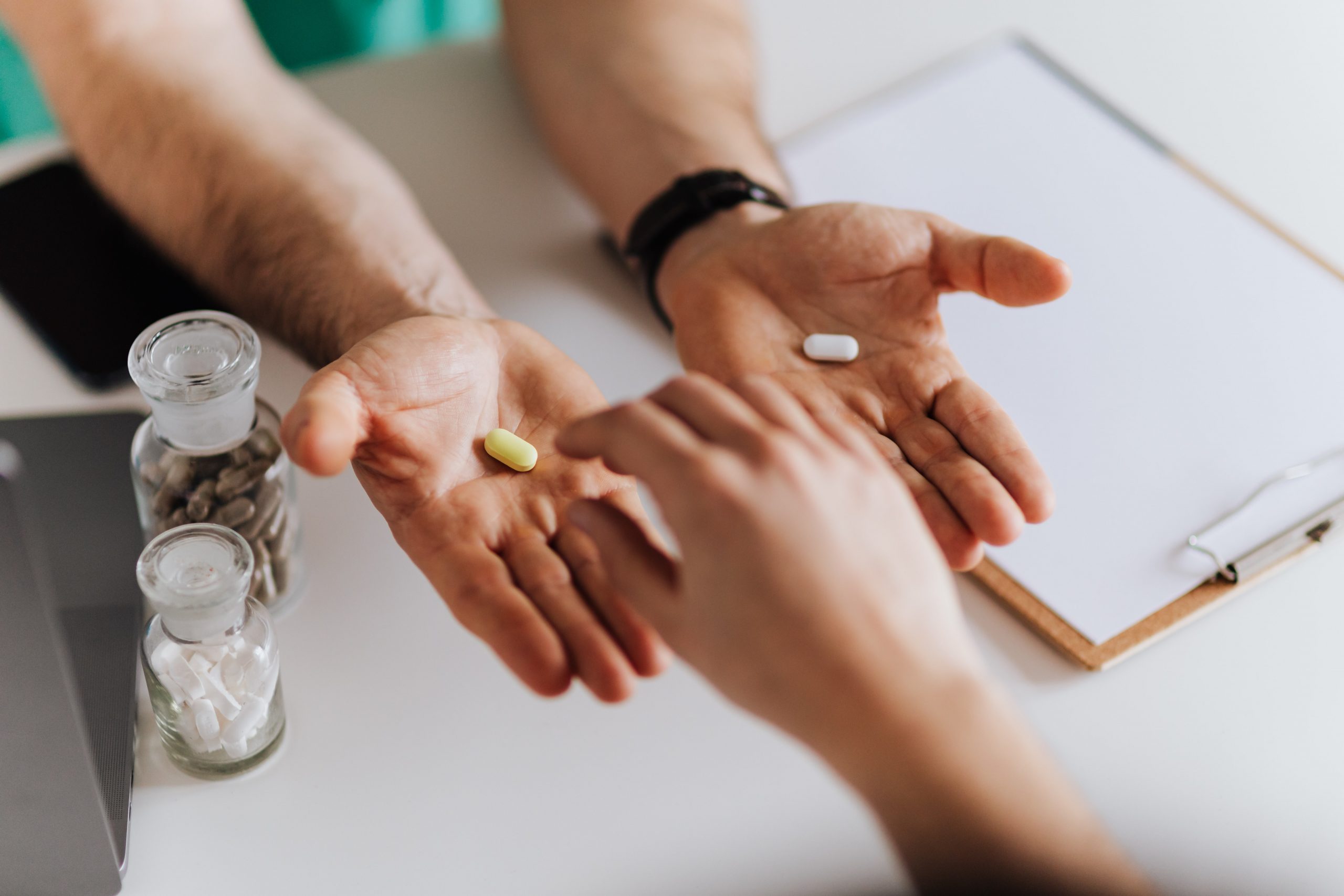 patient and doctor choosing medication