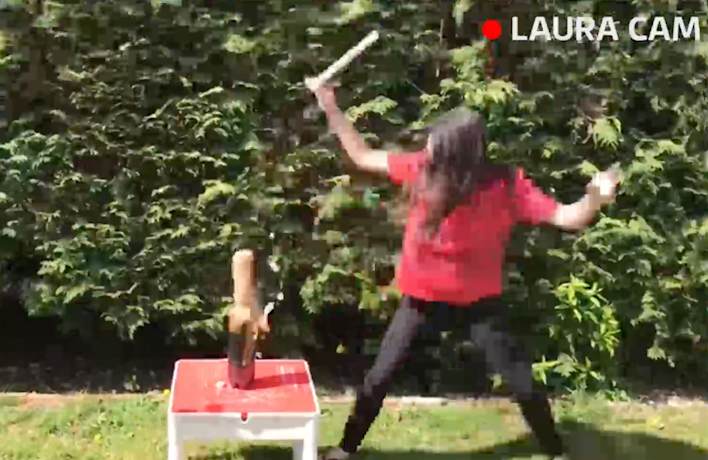 After Laura puts the mints in, the cola explodes.