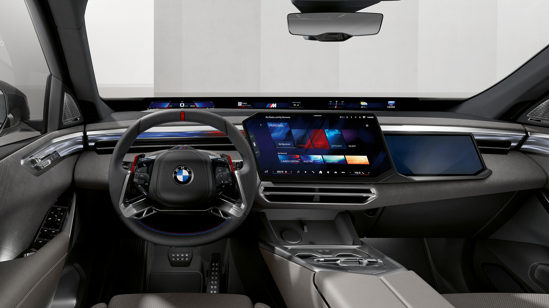 BMW X5 interior with digital displays.