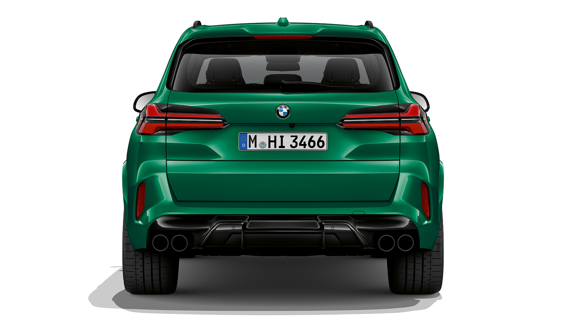 Rear view of a green BMW X5 M.