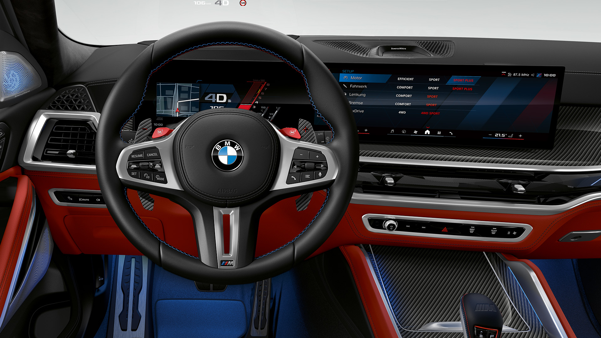 Interior view of a BMW car showing the steering wheel, dashboard with digital displays, and gear shift.