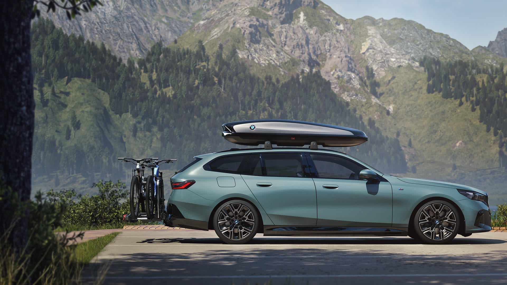 BMW with bicycle stand at the rear and storage box on top