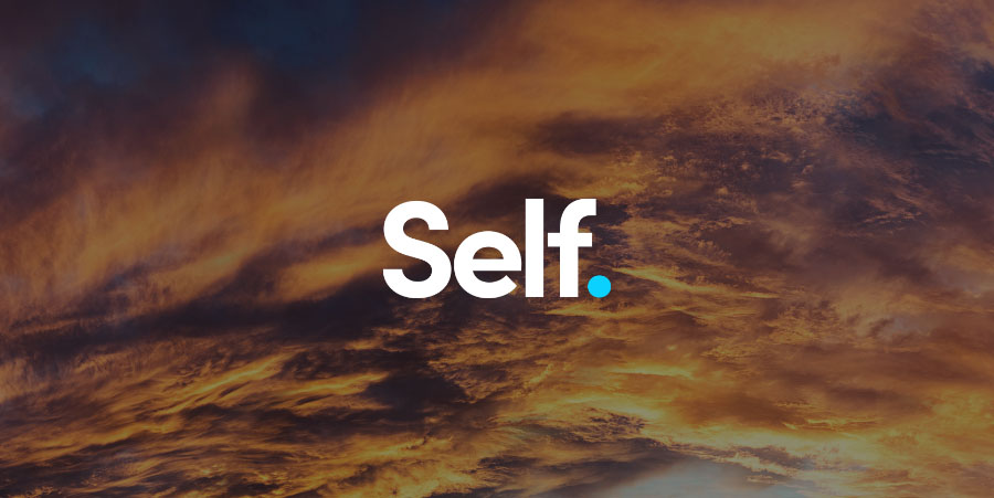 Self logo on sunset sky background