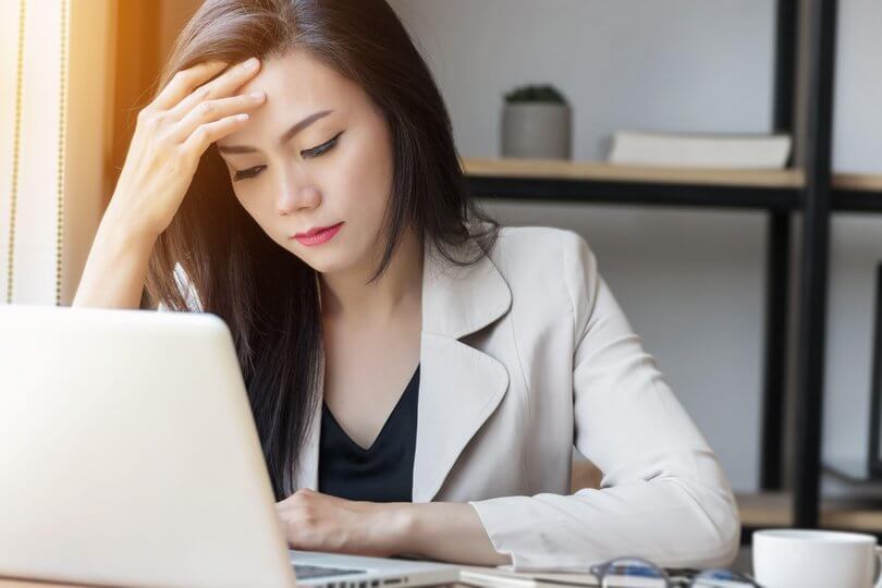 Business woman looking stressed