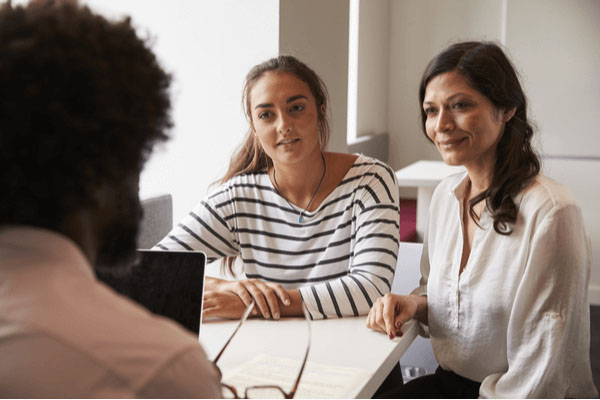 Mom and daughter applying for a loan