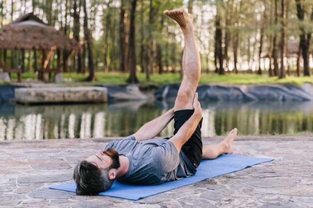 norman stretching hamstrings outdoors