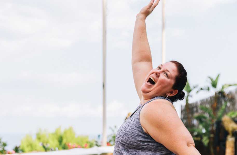 Fiona smiling in workout gear