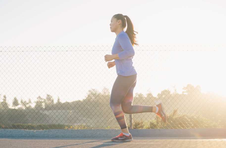 Woman running, female, Unsplash, Andrew Tanglao