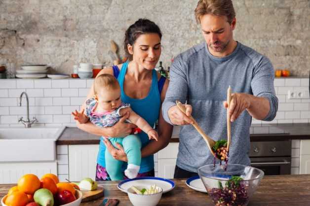 couple-and-a-baby-cooking-home