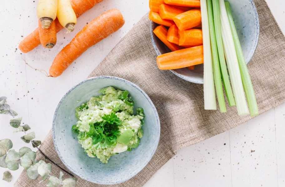 avocado feta dip with carrots and celery food