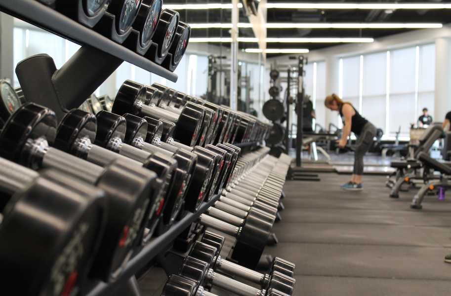 Gym, woman, dumbbell racks