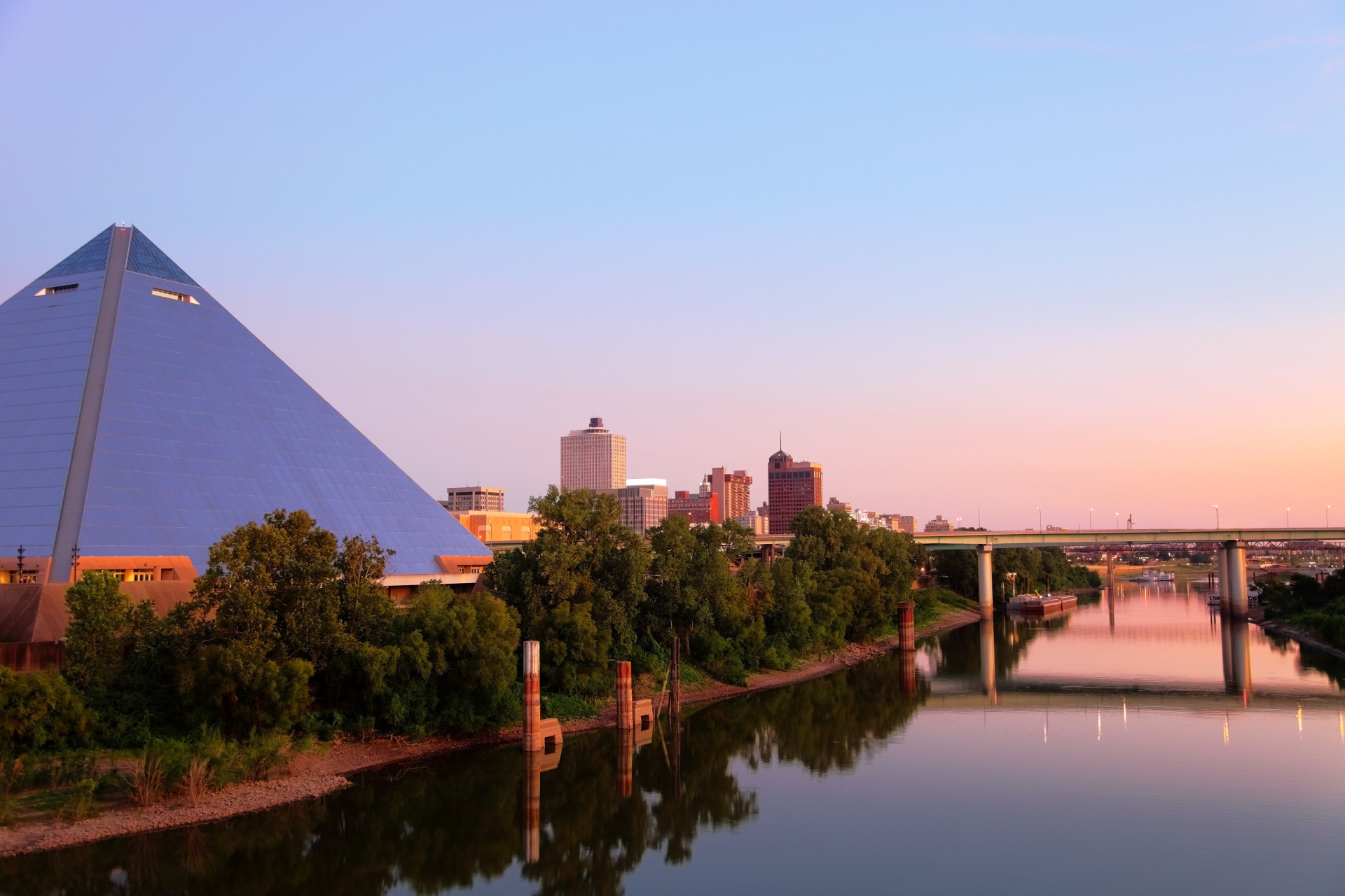 A guide to real estate investing in Memphis, including the best areas to seek an investment property in Memphis, such as Downtown, Cordova, and Bartlett. Image shows the Memphis Bass Pro Pyramid. 