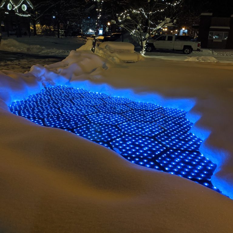 Solar driveways are a more eco-friendly material, and can also power your property. (Credit: Solar Roadways)