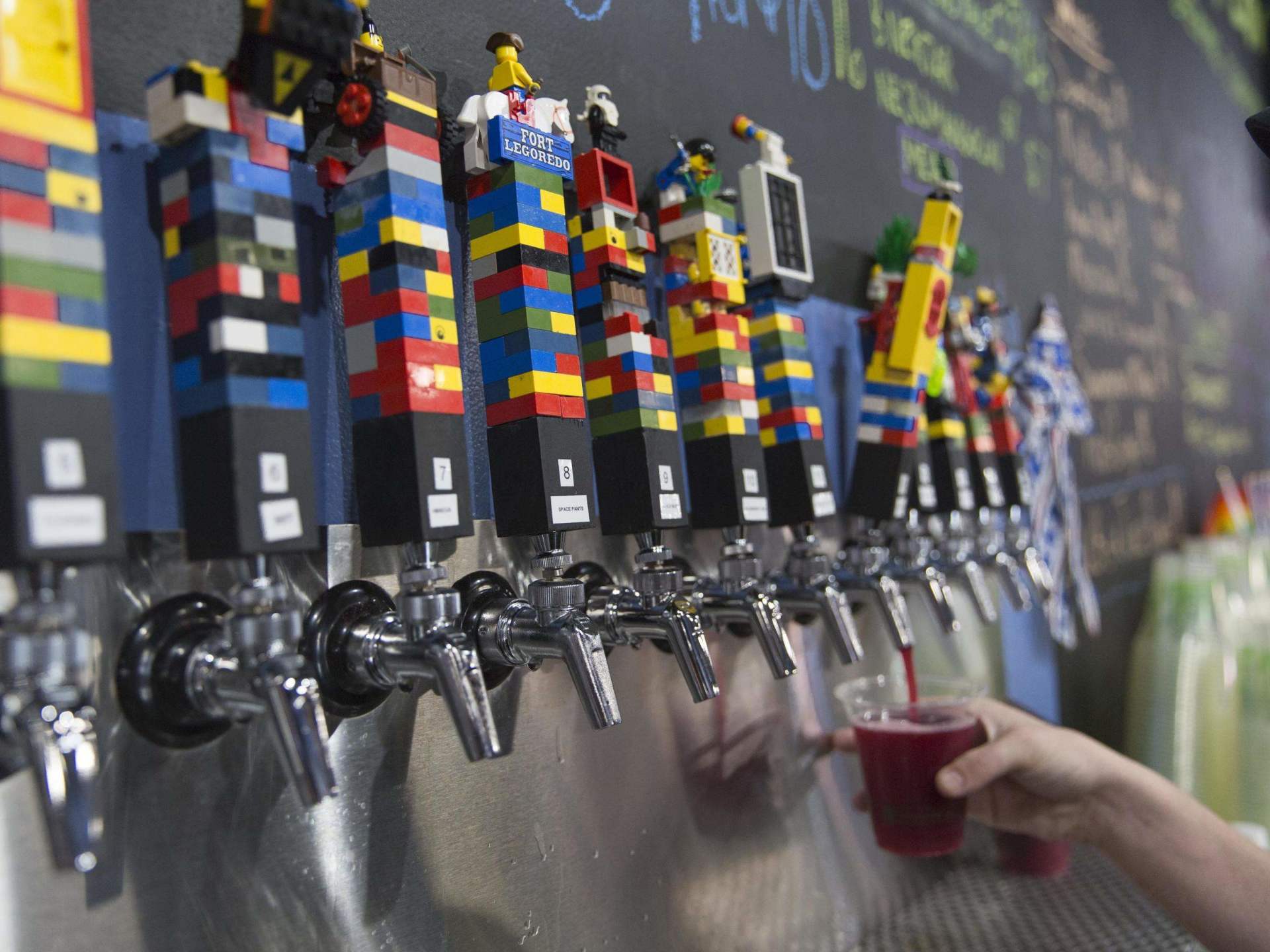The Overflowing Brewery and its Lego taps are a popular neighborhood spot in Palmetto Park. (Credit: VisitStPeteClearwater.com) 