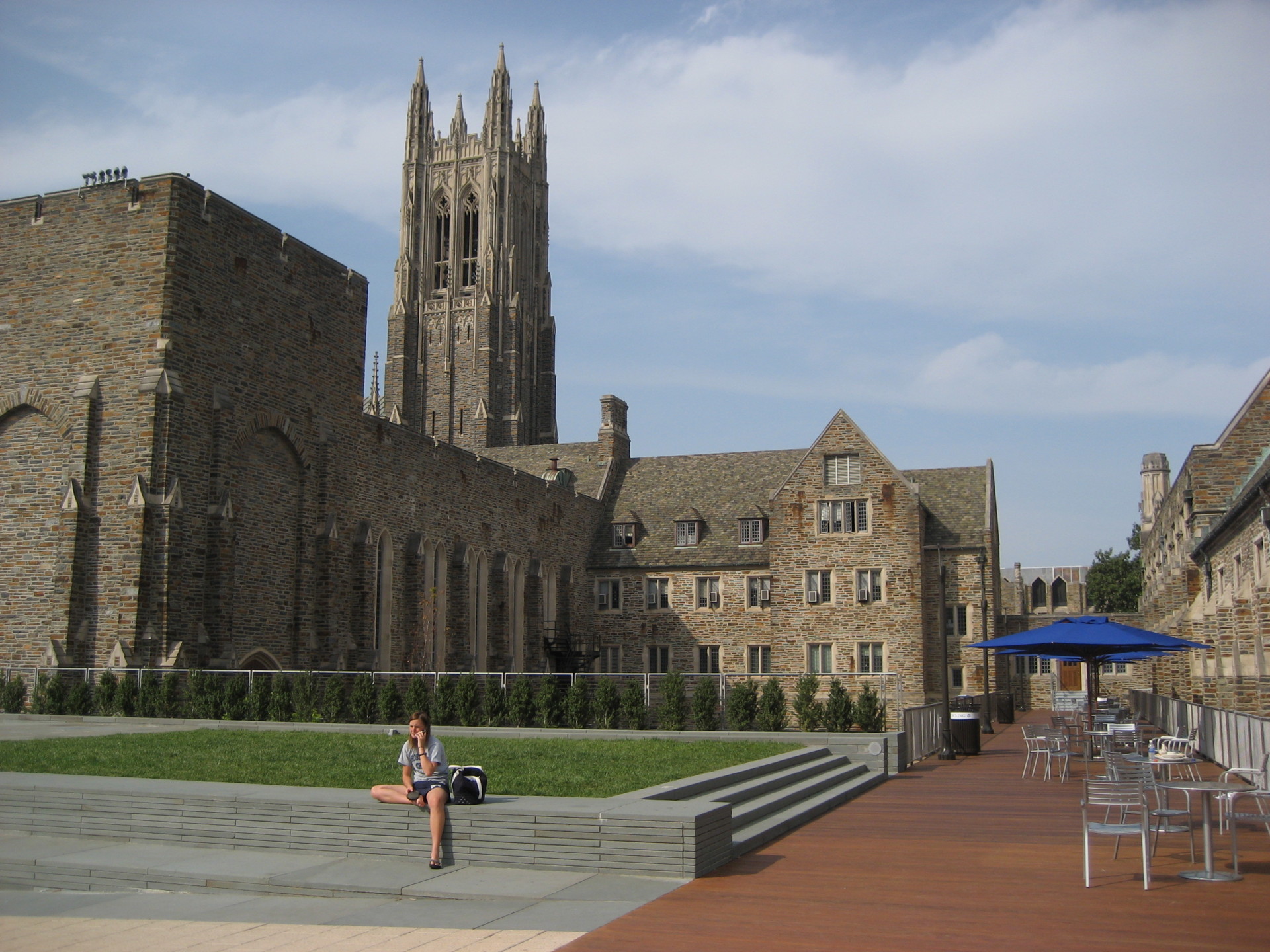 Duke University is one of North Carolina's Crown Jewels, and a key member of the renowned Research Triangle mentioned above. This photo of a student sitting outside of the Duke University chapel was taken from the Bryan Center walkway. The walkway was clo