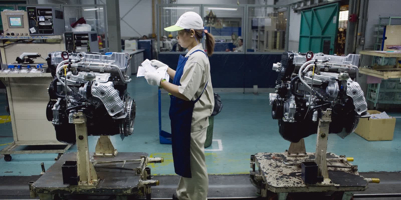 A factory worker in an automotive manufacturing facility.
