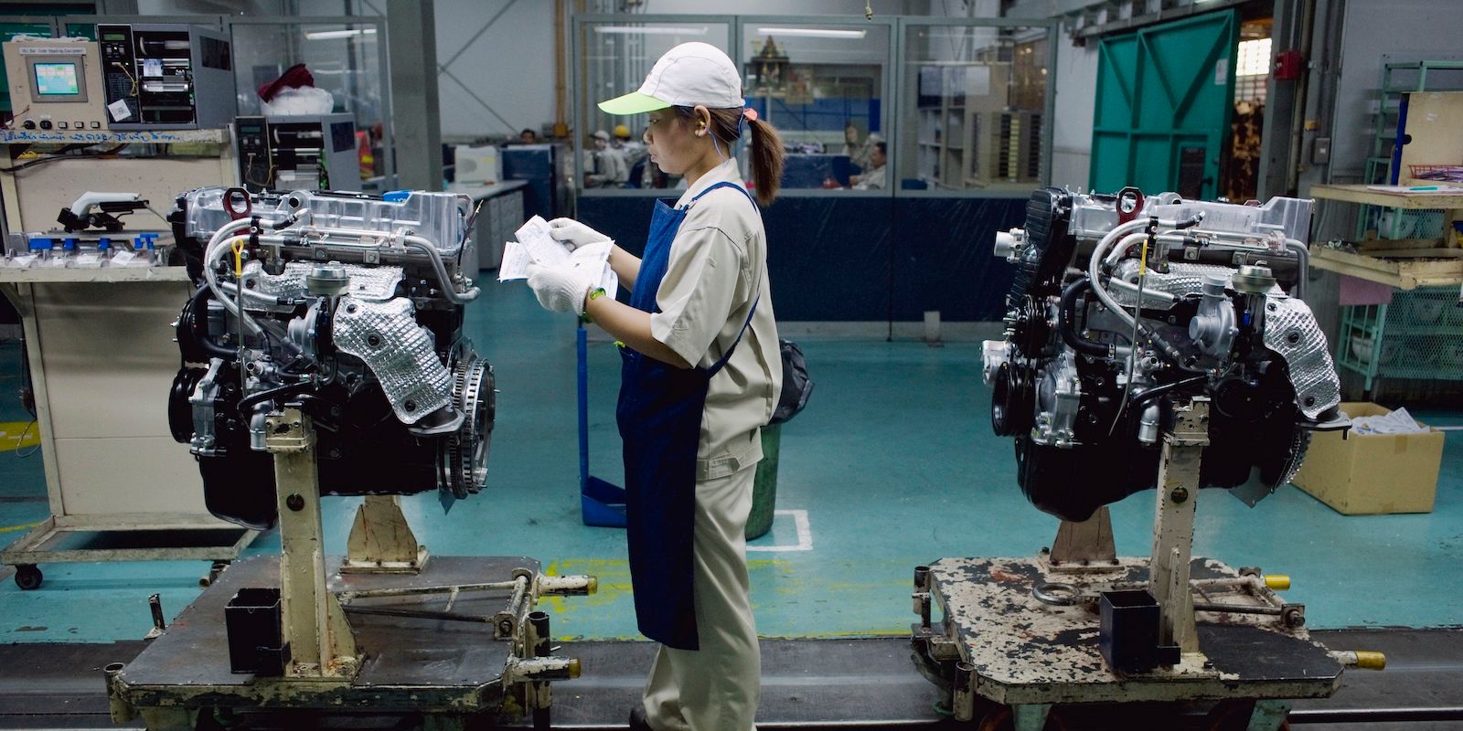 A factory worker in an automotive manufacturing facility.