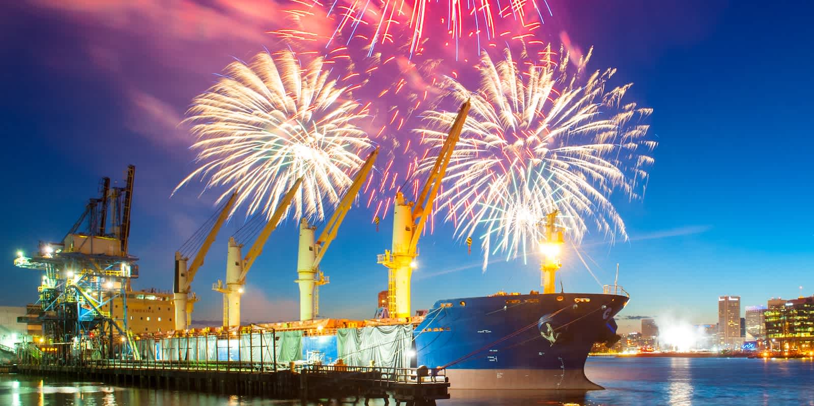 Fireworks over a bulk cargo ship at the port of Baltimore.