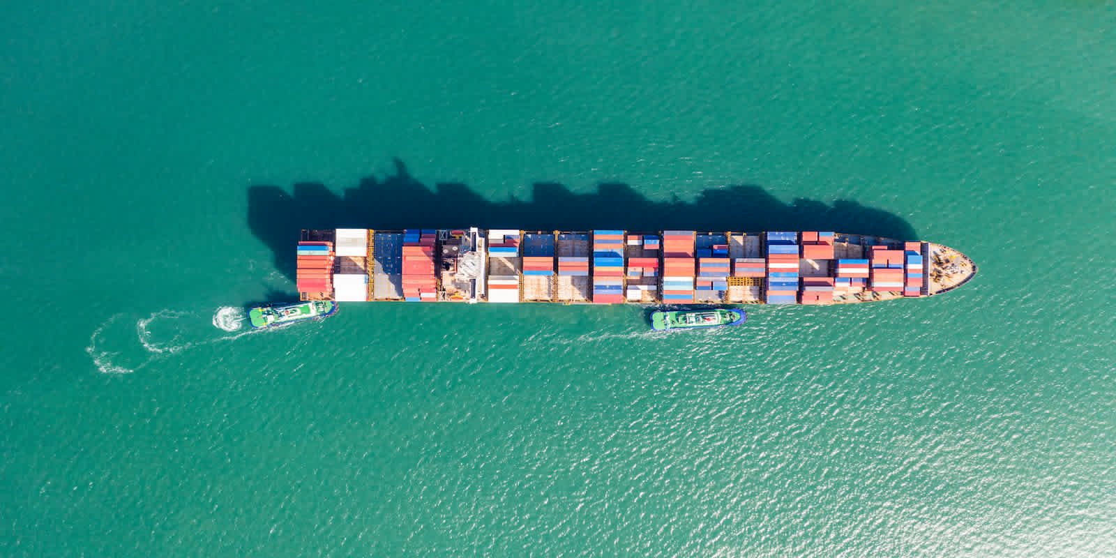 cargo-ship-sea-with-other-boats