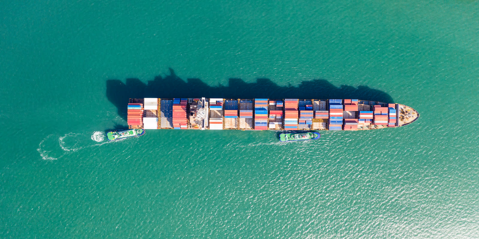 cargo-ship-sea-with-other-boats