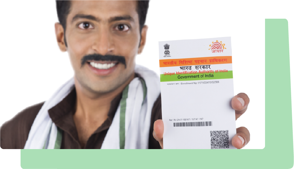 Person holding Indian Aadhaar Card