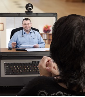 anytime-woman-can-contact-her-doctor-via-internet-picture-id802906760