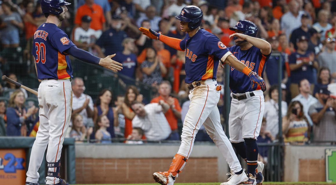 Houston Astros shortstop Jeremy Pena (3) celebrates with designated hitter Kyle Tucker (30) after hitting a home run during the fifth inning at Minute Maid Park. Mandatory Credit: Troy Taormina-USA TODAY Sports.