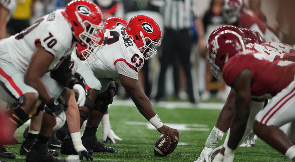 A general view of the line of scrimmage during the first quarter of the 2022 CFP college football national championship game between the Alabama Crimson Tide and the Georgia Bulldogs at Lucas Oil Stadium. Mandatory Credit: Kirby Lee-USA TODAY Sports.