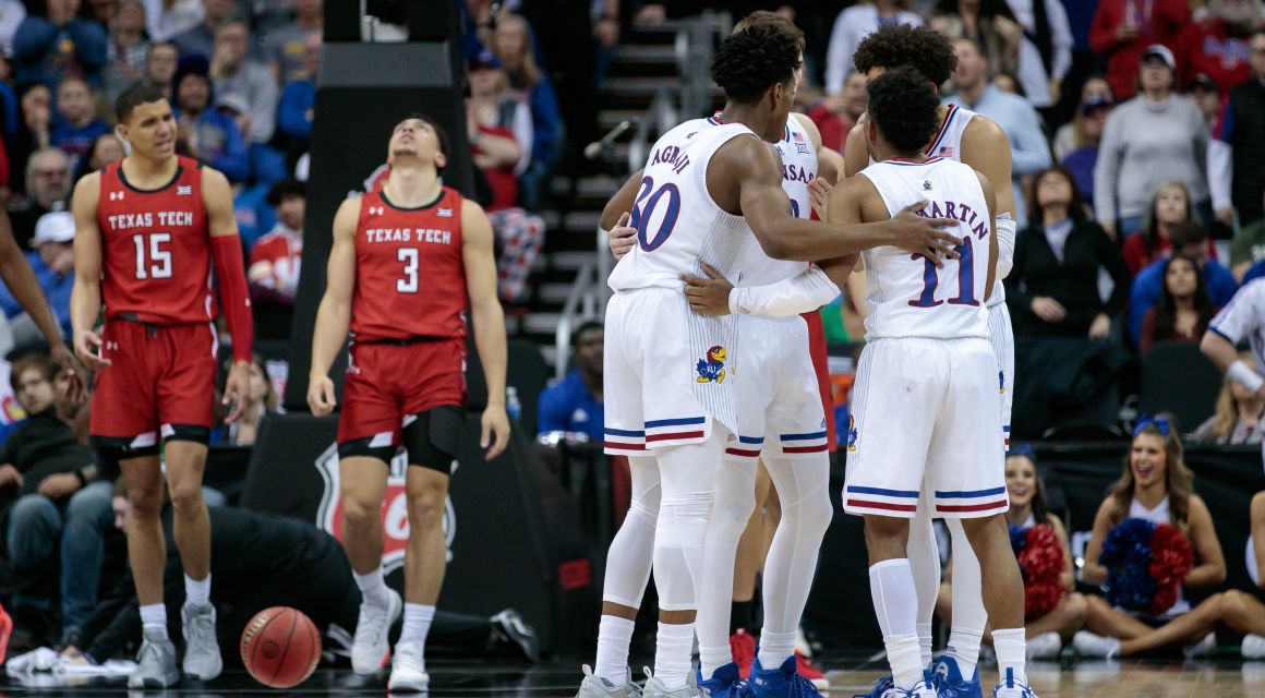 Kansas Jayhawks huddle in the last moments of the game against the Texas Tech Red Raiders at T-Mobile Center. Mandatory Credit: William Purnell-USA TODAY Sports.