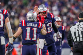 Tom Brady (12) and New England Patriots receiver Julian Edelman (11) celebrate after a touchdown during the first half against the Kansas City Chiefs