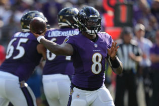 Baltimore Ravens quarterback Lamar Jackson (8) passes in the fourth quarter against the Miami Dolphins