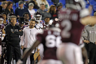Mississippi State Bulldogs head coach Mike Leach watches during the second half against the Texas Tech Red Raiders at Liberty Bowl Stadium. Mandatory Credit: Petre Thomas-USA TODAY Sports.