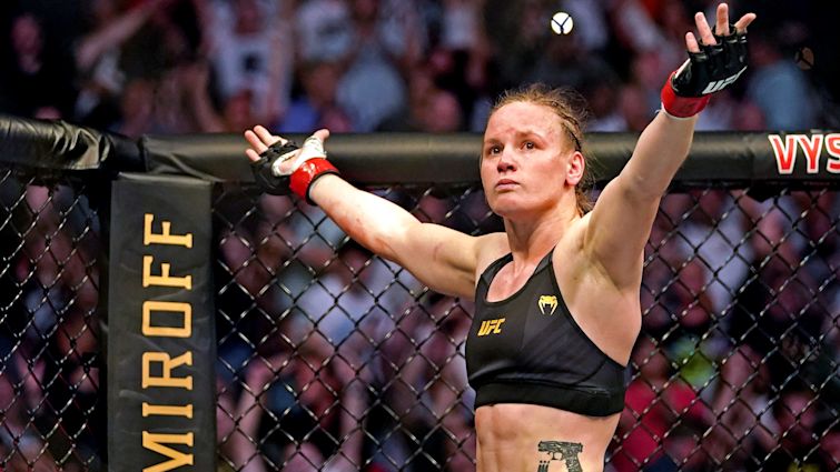 Valentina Shevchenko (Red Gloves) fights Jessica Andrade (Blue Gloves) during UFC 261 at VyStar Veterans Memorial Arena on April 24, 2021.