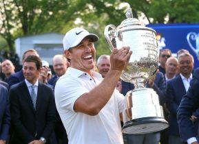 Brooks Koepka is awarded the Wanamaker trophy after winning the PGA at Oak Hill Country Club with a 9-under final score.