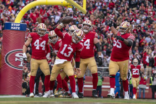 San Francisco 49ers quarterback Brock Purdy (13) celebrates after scoring a touchdown against the Tampa Bay Buccaneers during the second quarter at Levi's Stadium