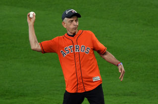 Oct 5, 2017; Houston, TX; Jim McIngvale aka Mattress Mack delivers the first pitch before Game 1 of the 2017 ALDS. / © Shanna Lockwood-USA TODAY Sports