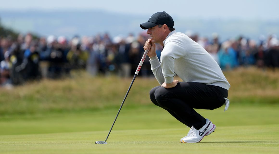 Rory McIlroy lines up a putt on the seventh hole during the second round of The Open Championship golf tournament at Royal Liverpool.