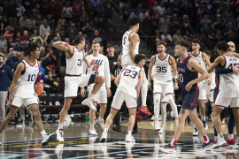 Gonzaga Bulldogs celebrate after defeating the Saint Mary's Gaels after the game in the finals of the WCC Basketball Championships at Orleans Arena. Mandatory Credit: Kyle Terada-USA TODAY Sports