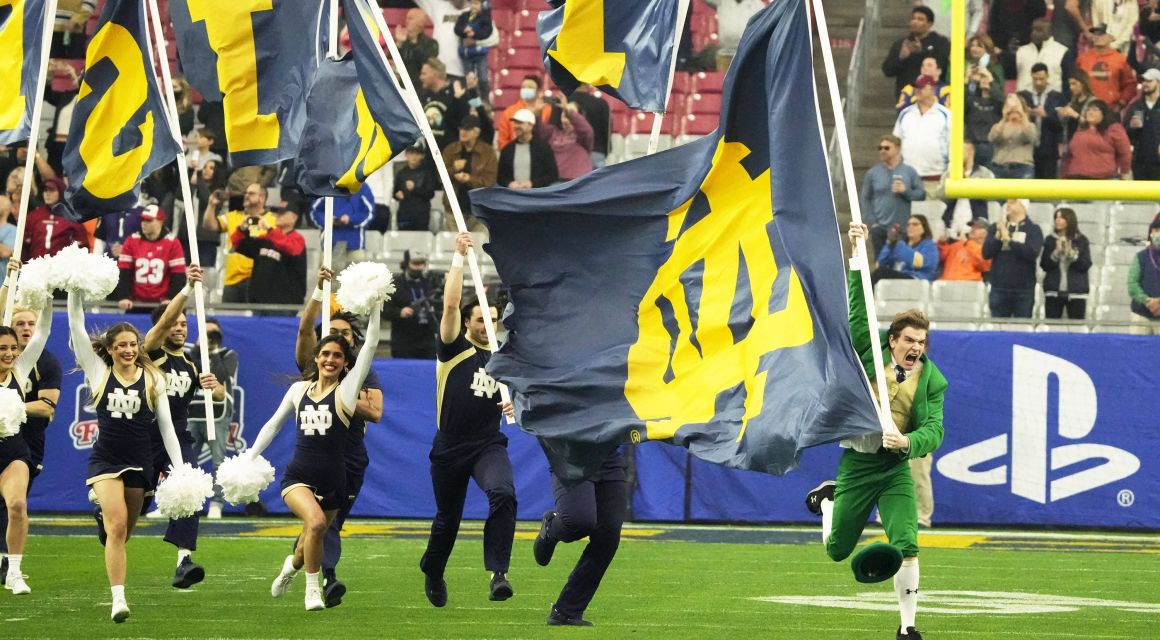 Notre Dame Fighting Irish take the field to play the Oklahoma State Cowboys in the PlayStation Fiesta Bowl at State Farm Stadium