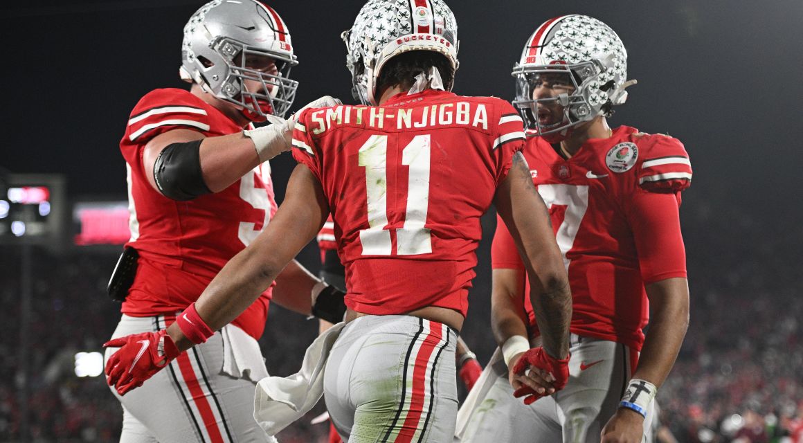 Ohio State Buckeyes wide receiver Jaxon Smith-Njigba (11) celebrates with quarterback C.J. Stroud (7)after making a catch for a touchdown against the Utah Utes in the fourth quarter during the 2022 Rose Bowl college football game at the Rose Bowl. Mandatory Credit: Orlando Ramirez-USA TODAY Sports.
