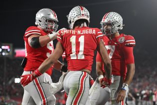 Ohio State Buckeyes wide receiver Jaxon Smith-Njigba (11) celebrates with quarterback C.J. Stroud (7)after making a catch for a touchdown against the Utah Utes in the fourth quarter during the 2022 Rose Bowl college football game at the Rose Bowl. Mandatory Credit: Orlando Ramirez-USA TODAY Sports.