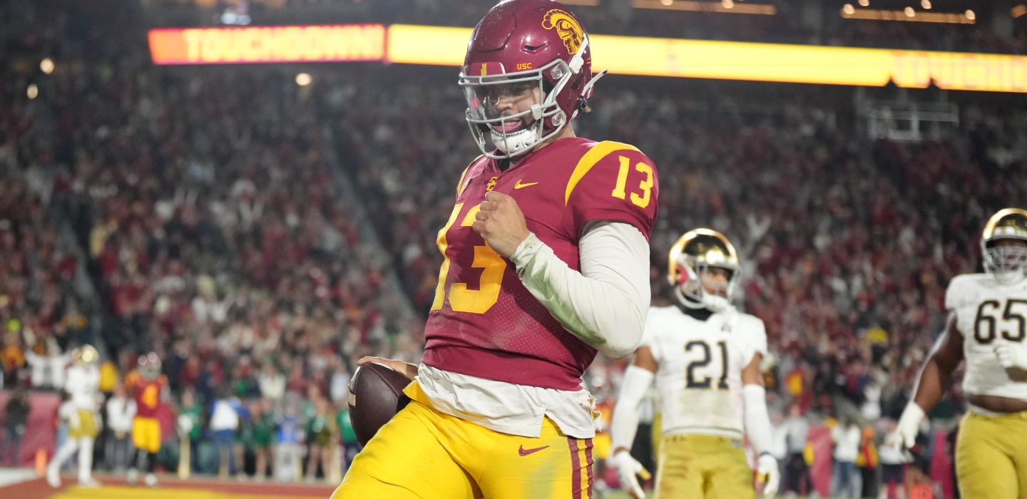 Southern California Trojans quarterback Caleb Williams (13) rushes for a touchdown in the second half against the Notre Dame Fighting Irish at United Airlines Field at Los Angeles Memorial Coliseum.