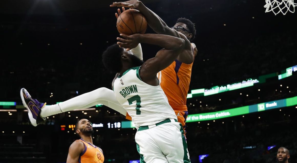 Dec 31, 2021; Boston, Massachusetts, USA; Phoenix Suns forward Emanuel Terry (10) blocks a shot by Boston Celtics guard Jaylen Brown (7) during the first half at TD Garden. Mandatory Credit: Winslow Townson-USA TODAY Sports